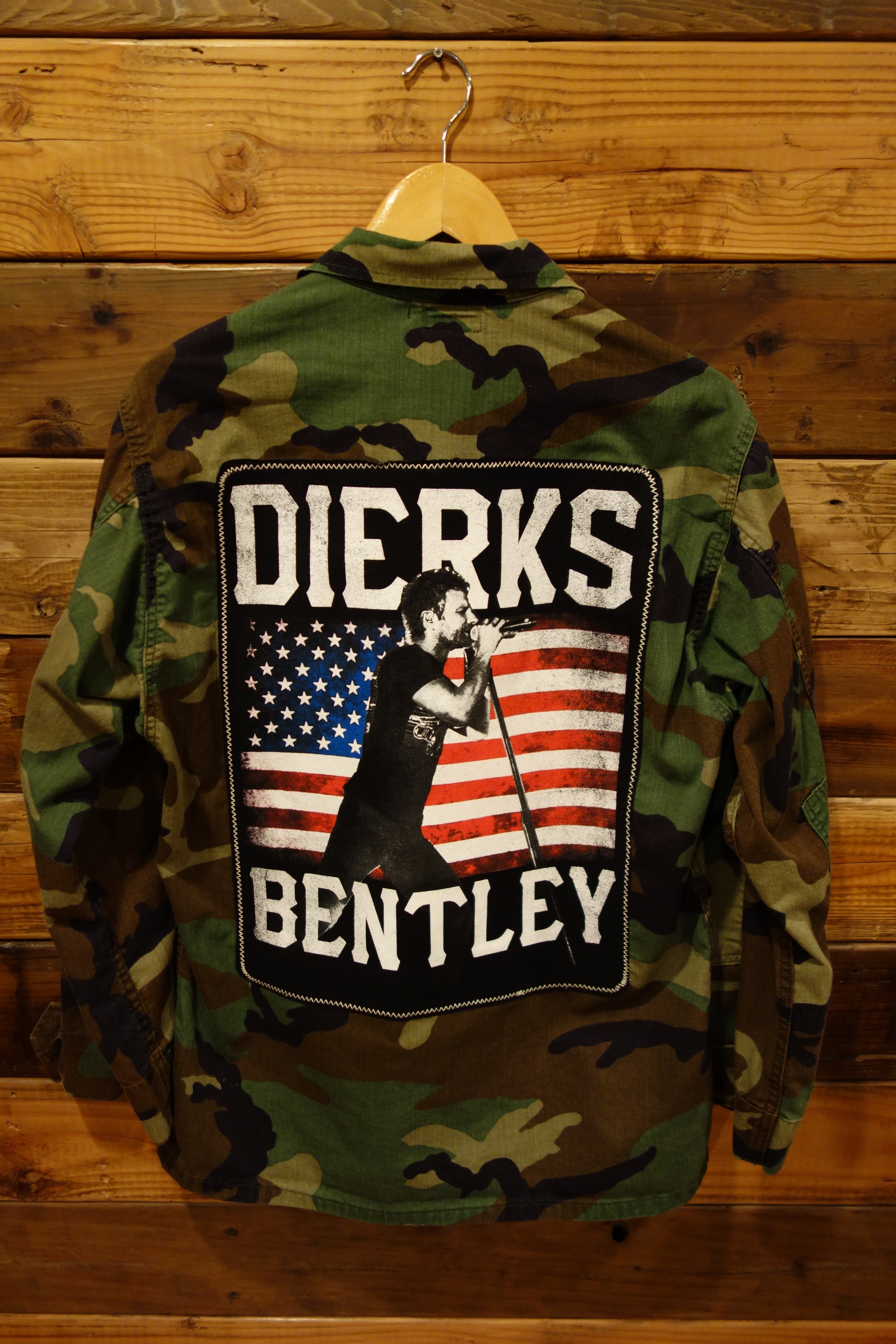 Dirks Bentley concert tee, military issued camo jacket